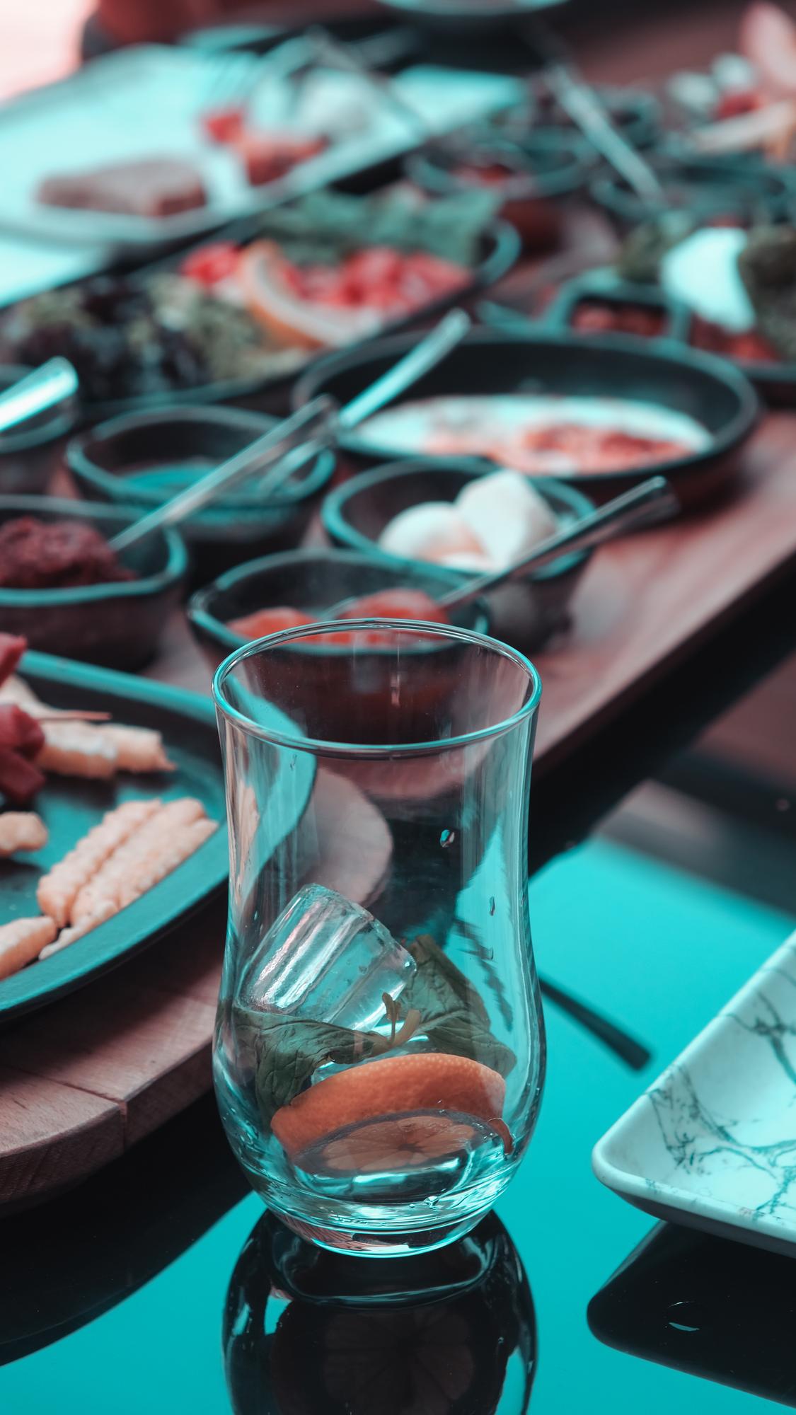 Workshop table with plated tasting portions and knives